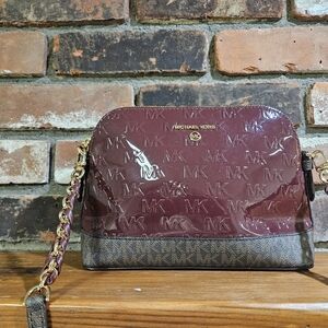 Michael kors jet set crossbody bag. Burgundy with gold chain. Small bag